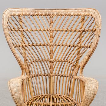 a rattan chair by Gio Ponti & Lio Carminati, Italy, second half of the 20th century.