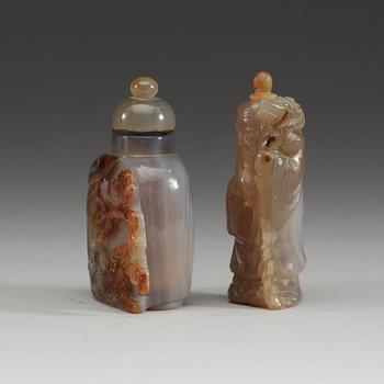 Two Chinese agate snuff bottles with stoppers.