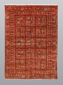 A rug, Ziegler design figural, ca 235 x 168 cm.