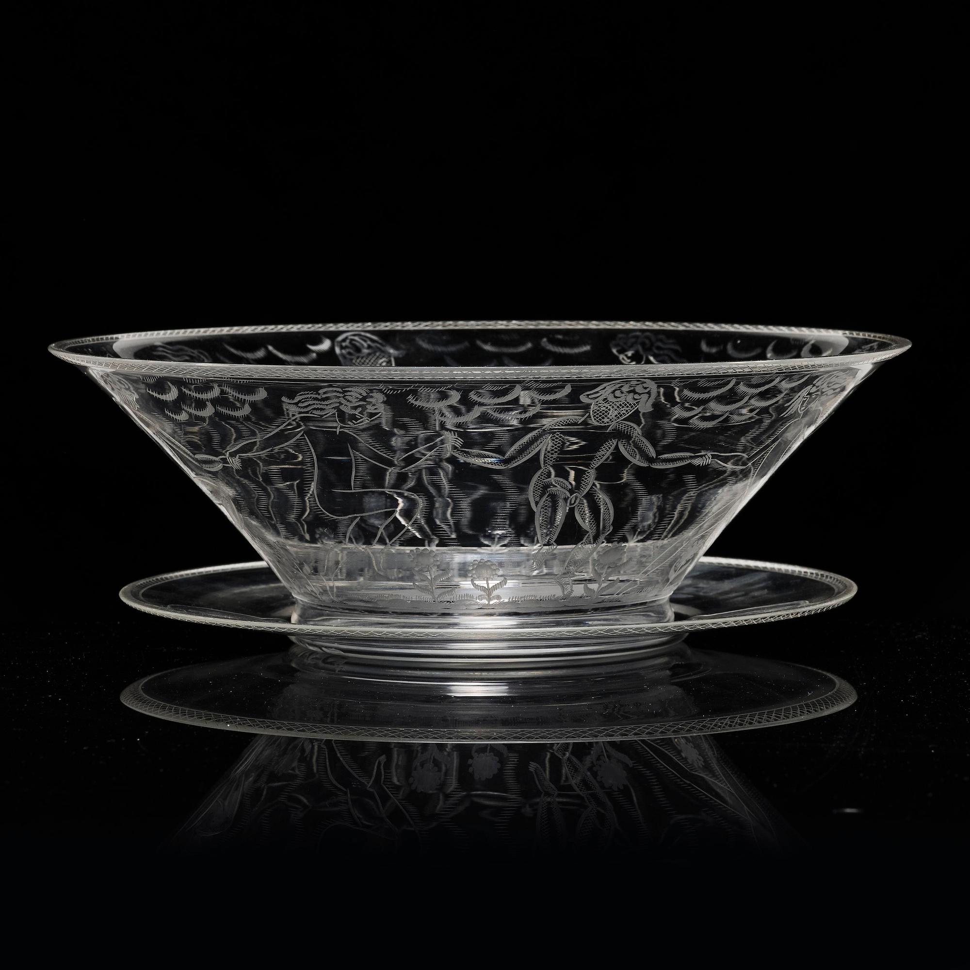 Edward Hald, an engraved glass bowl with plate, Orrefors, Sweden, 1926, model 305, engraved by Emil Goldmann.
