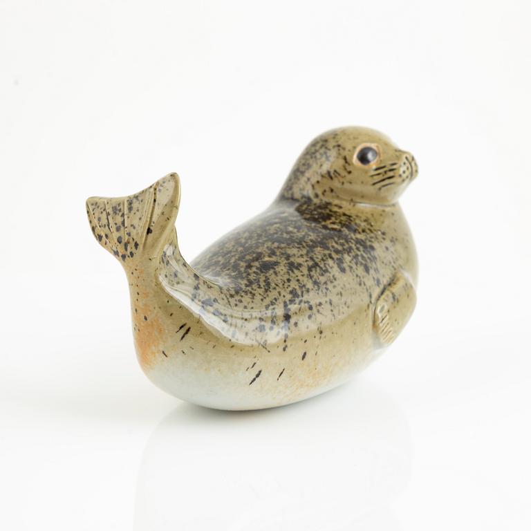 Lisa Larson, two figurines, 'Utter' and 'Gråsäl' for Nordiska Kompaniet in collaboration with WWF, Gustavsberg.