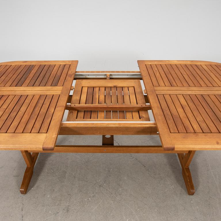 A 9 pcs stained teak garden suite by Brafab around 2000.