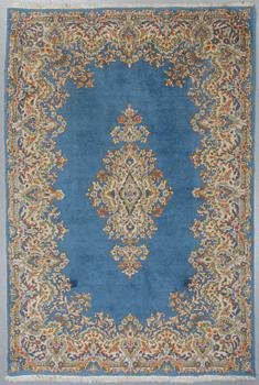 Matto, a semi-antique/an old Kerman, ca 270,5-272,5 x 182-183 cm.