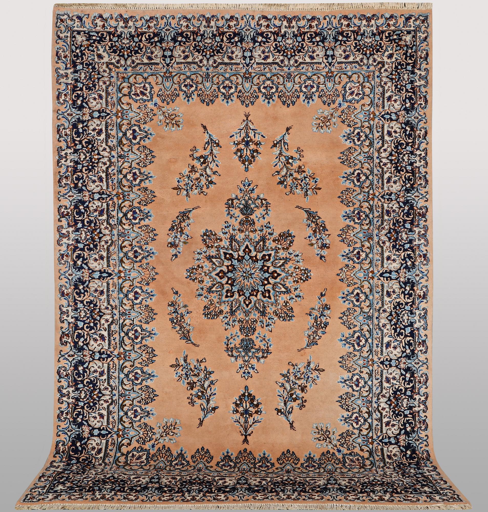A carpet, Kerman, ca 352 x 188 cm.