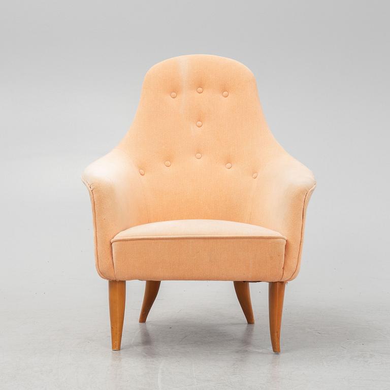 Kerstin Hörlin-Holmquist, a 'Lilla Eva' armchair, from the series 'Paradiset', Nordiska Kompaniet, mid 20th Century.