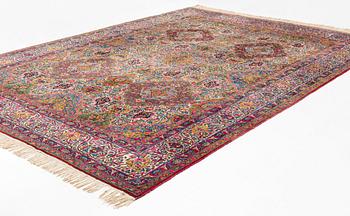 A semi-antique Kerman carpet, ca  402 x 291 cm.