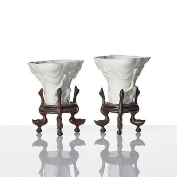 Two blanc de chine rhinoceros libation cups, Qing dynasty, Kangxi (1662-1722).