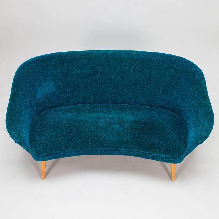 A 1950s sofa and armchair.