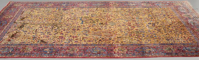 A carpet, a semi-antique silk Kashan figural, ca 309-310 x 204,5-207 cm.