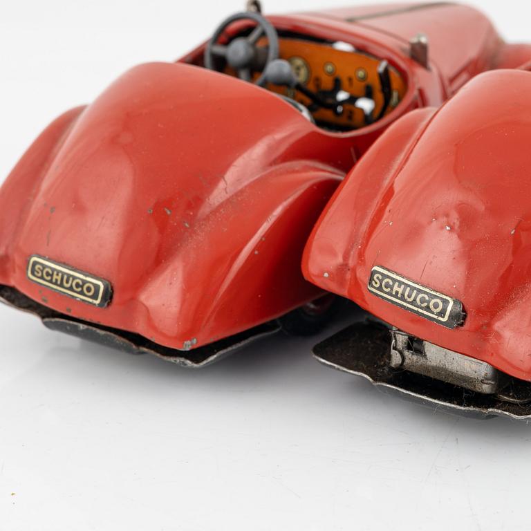 A set of five toy cars, mostly Schuco, Germany.