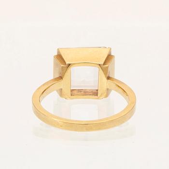 An 18K gold ring set with square step cut topaz by Wiwen Nilsson 1944.