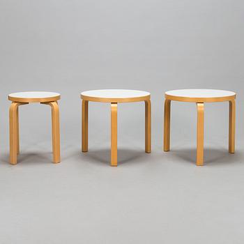 Alvar Aalto, a pair of late 20th century tables, model no 90D and a 21th century stool, model no E60, Artek, Finland.