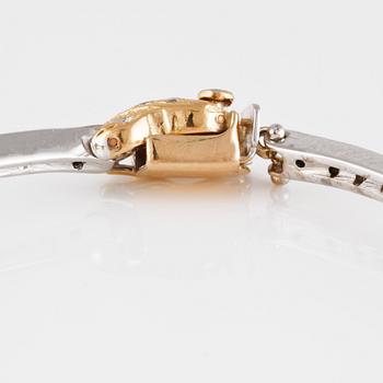 ARMBAND, 14K guld och vitguld med briljantslipade vita och gula diamanter ca 1.30 ct.  Vikt 12,7 gram.