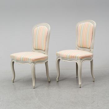 A mid 18th Century matched pair of Rococo chairs.