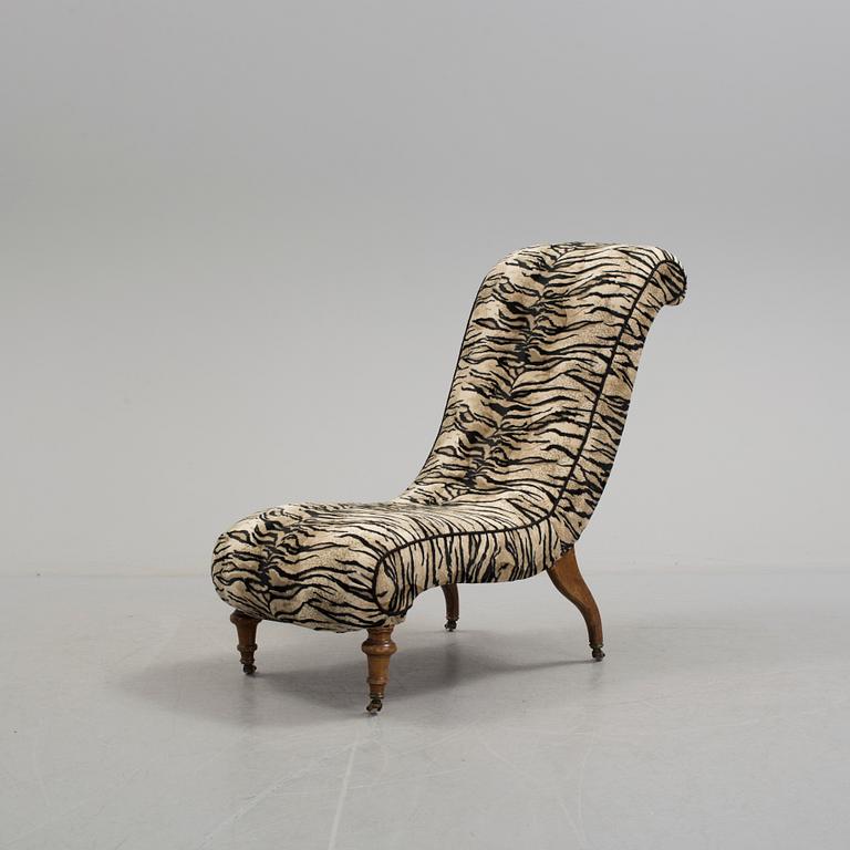 A late 19th century easy chair.