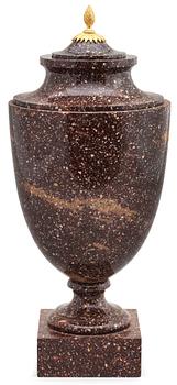 639. A late Gustavian 19th Century porphyry and gilt bronze urn.