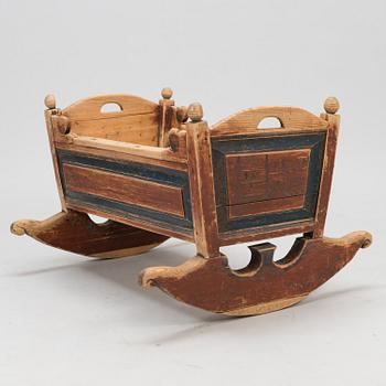 A cradle dated 18.9 1845.