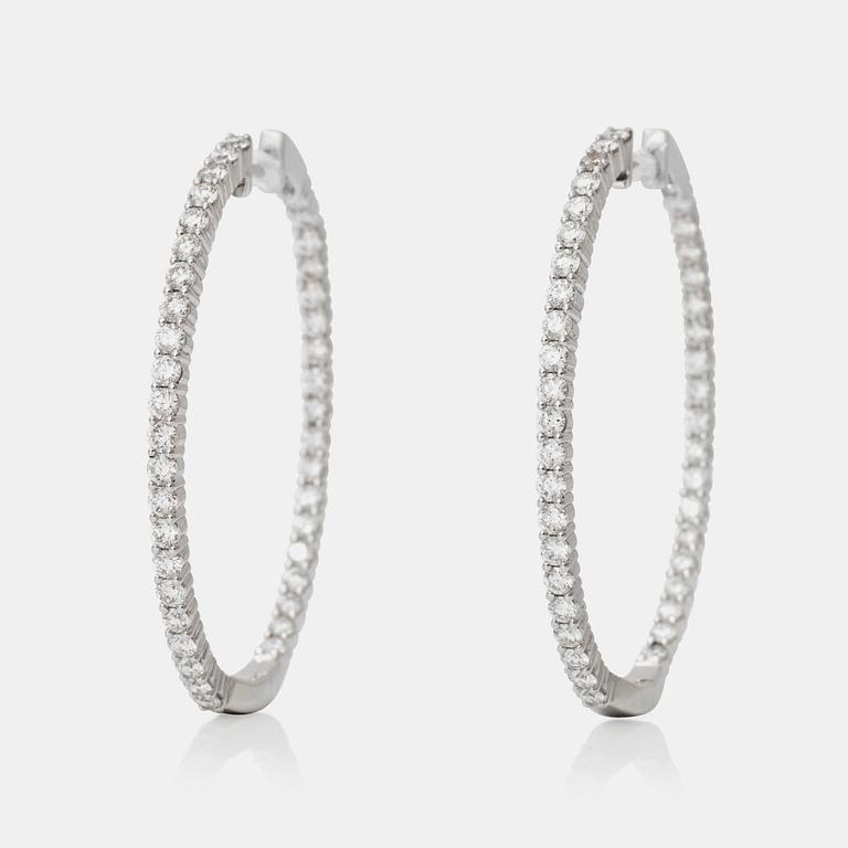 A pair of brilliant-cut diamond earrings. Total carat weight circa 2.30 cts.