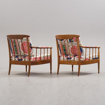 a pair of "Skrindan" armchairs, by Kerstin Hörlin-Holmquist, OPE.