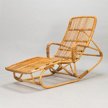 A rattan lounger, mid-20th century.