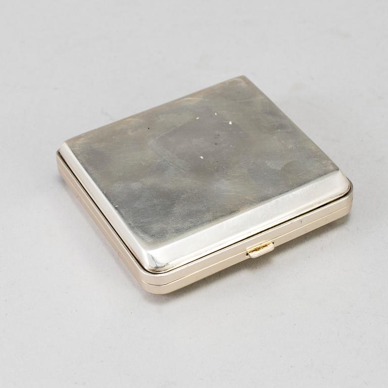 A silver calculator by Tiffany's and cuff link box in silver H.V.P & Co Birmingham 1887.