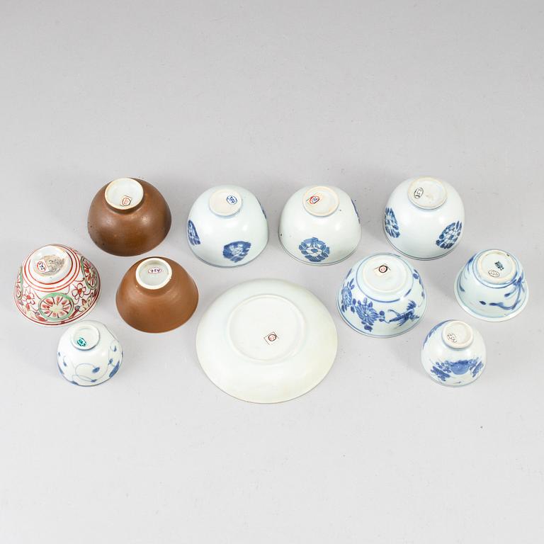 Eleven porcelain cups with one dish, Mostly Qing dynasty, 18th century.