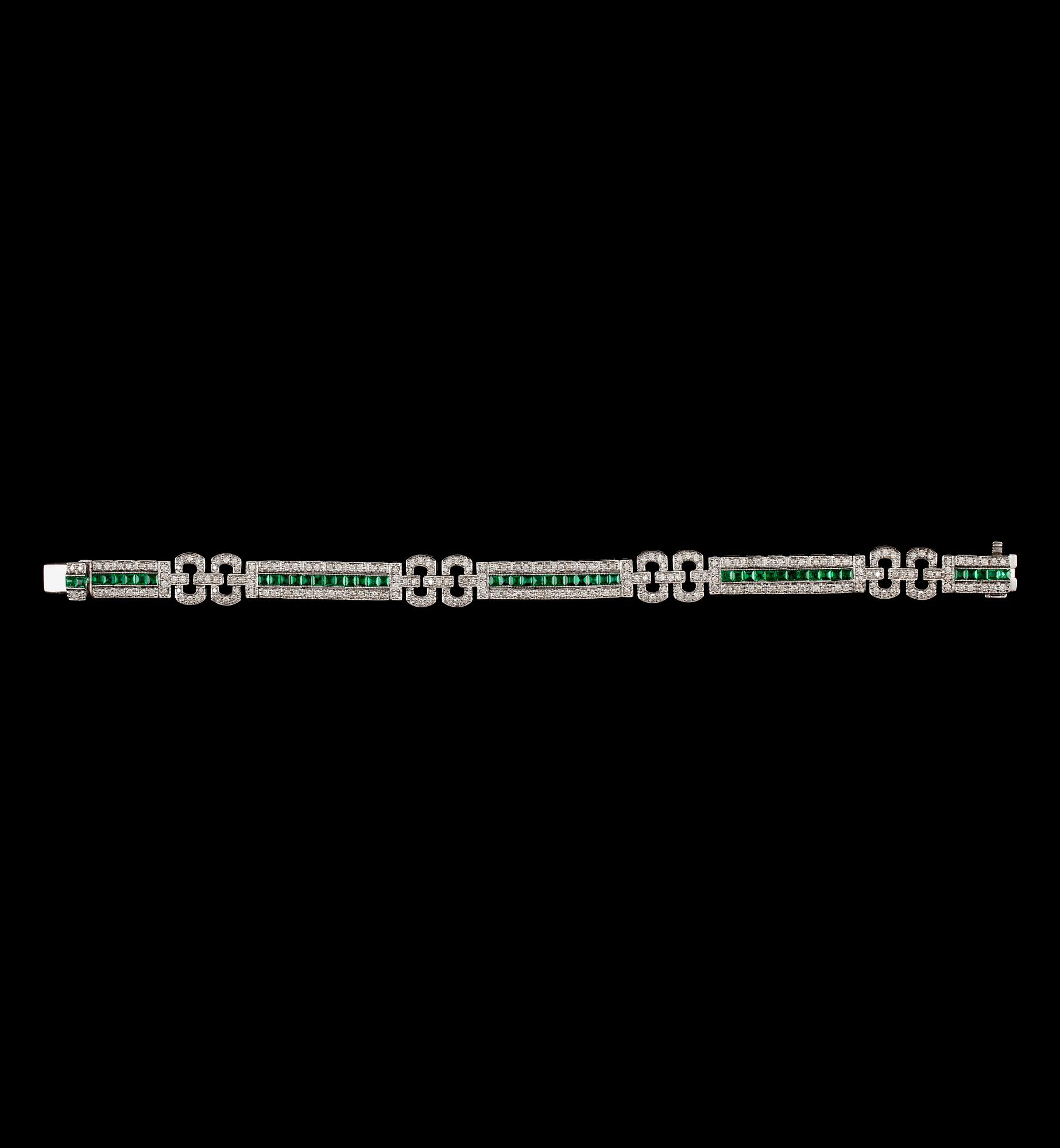 A diamond, 2.39 cts, and emerald, 2.61 cts, bracelet.