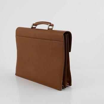 Prada, a briefcase.