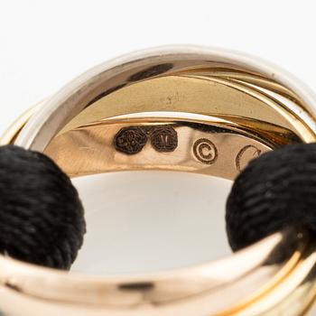 A Cartier "Trinity" bracelet, 18K three colour gold and textile.