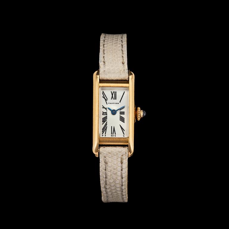 A Cartier gold ladie's wrist watch.