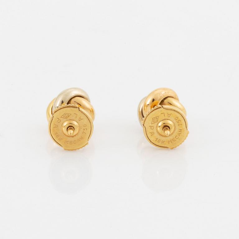 Ett par örhängen Cartier "Trinity" 18K guld med runda briljantslipade diamanter.
