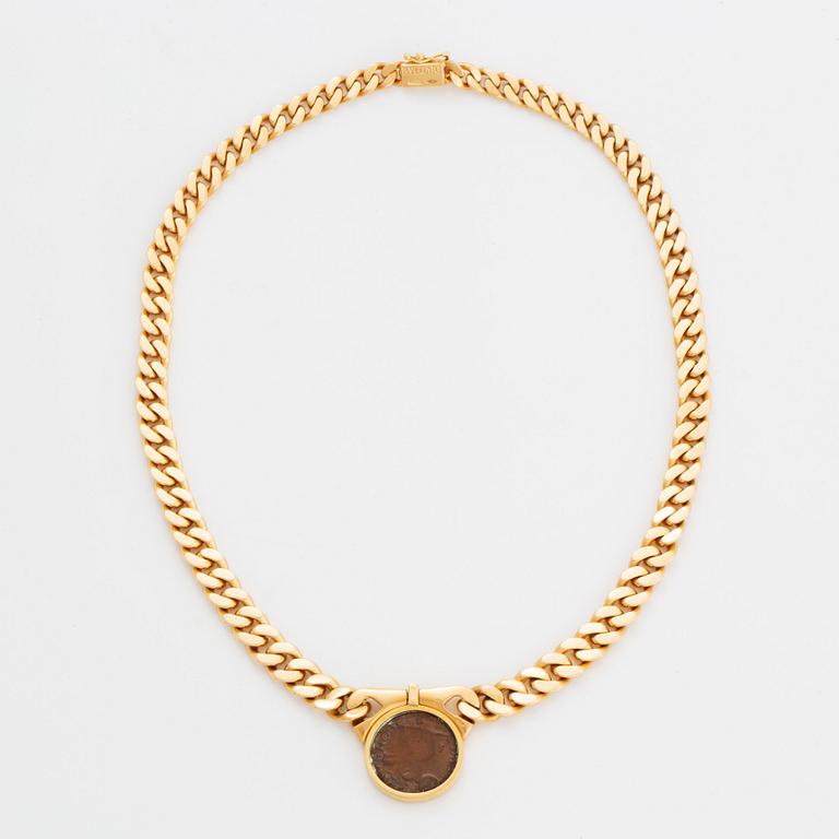 Bulgari "Monete" collier 18K guld med ett romerskt mynt och en baguetteslipad diamant.