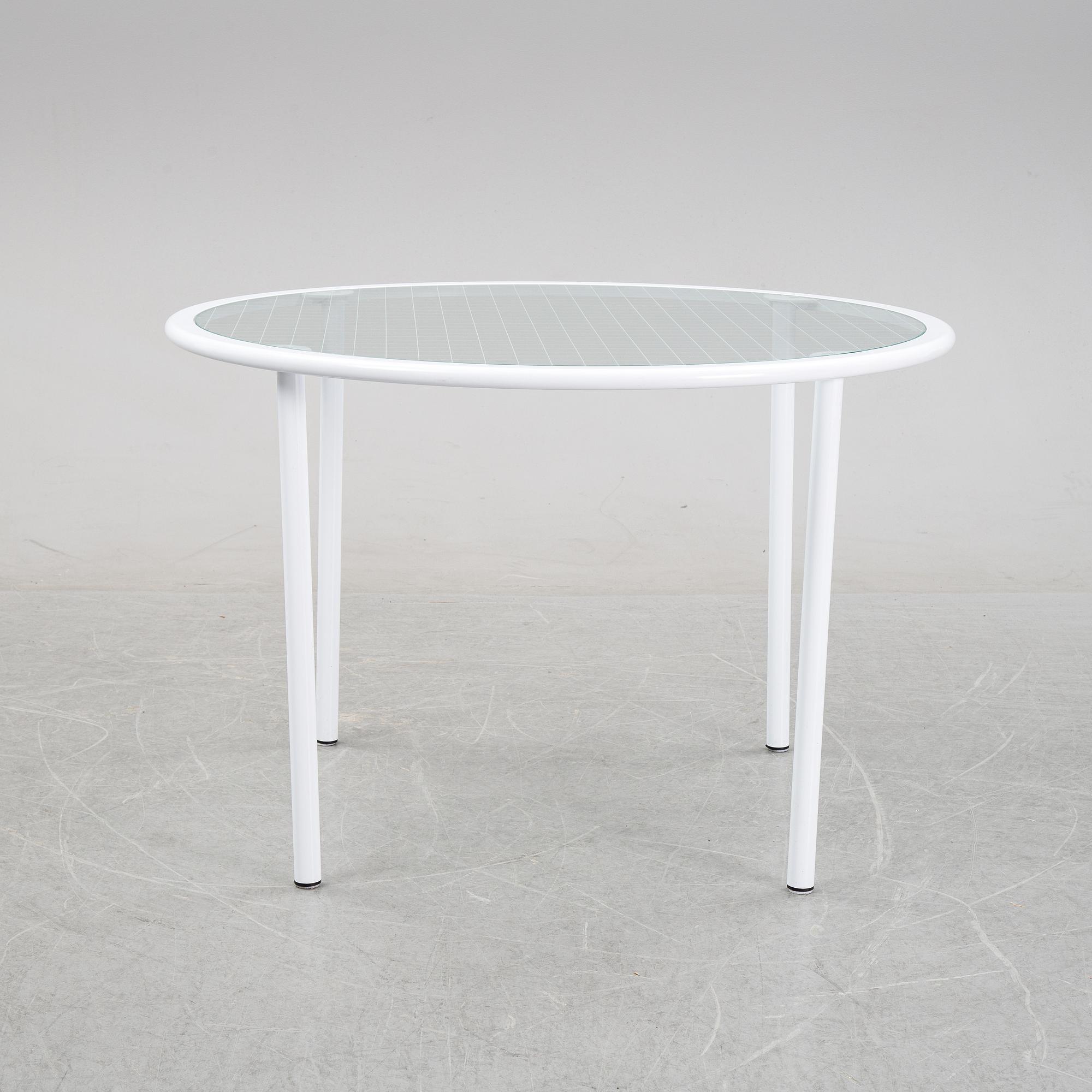 Giandomenico Belotti, attributed to, a griddled glass and metal dining table, by Fly Line, Italy, 1970s.