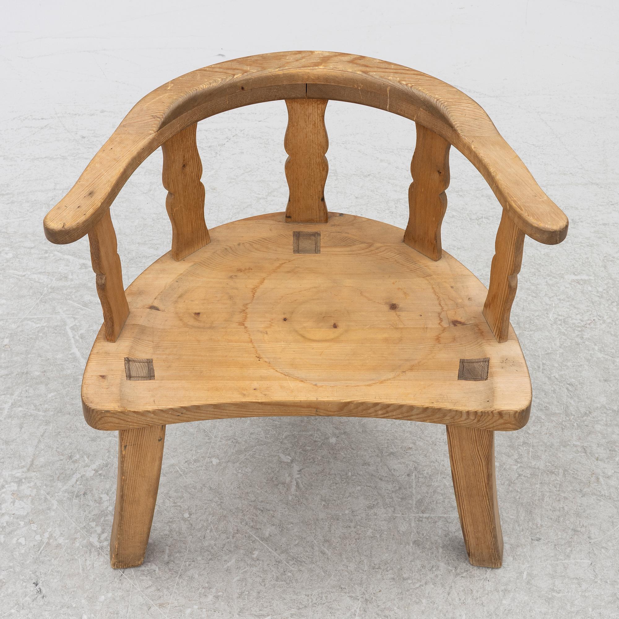 A folk art chair, circa 1900.