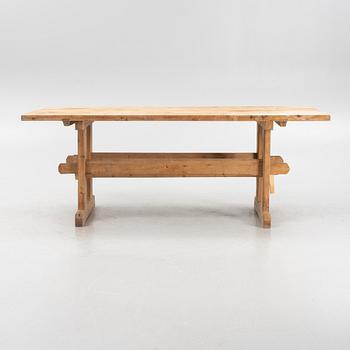 A 19th Century pinewood trestle table, 19th Century.