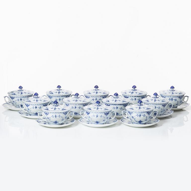 Royal Copenhagen, twelve consommé cups with saucers, 'Blue Fluted Half Lace', Denmark.