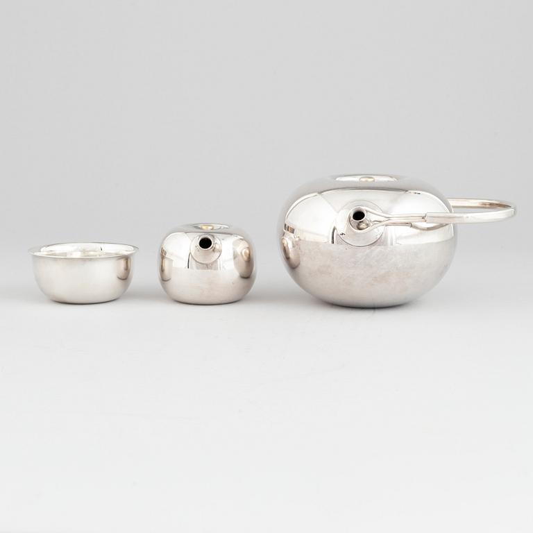Vivianna Torun Bülow-Hübe, an electroplated brass teapot, a creamer and a sugarbowl, Dansk International Designs Ltd.