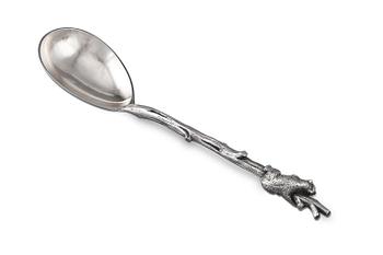 A SILVER SPOON.