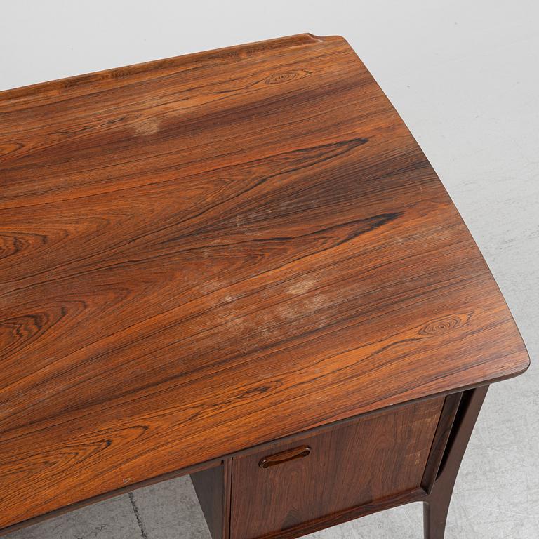 A rosewood-veneered desk, HP Hansen, Denmark, 1950's/60's.