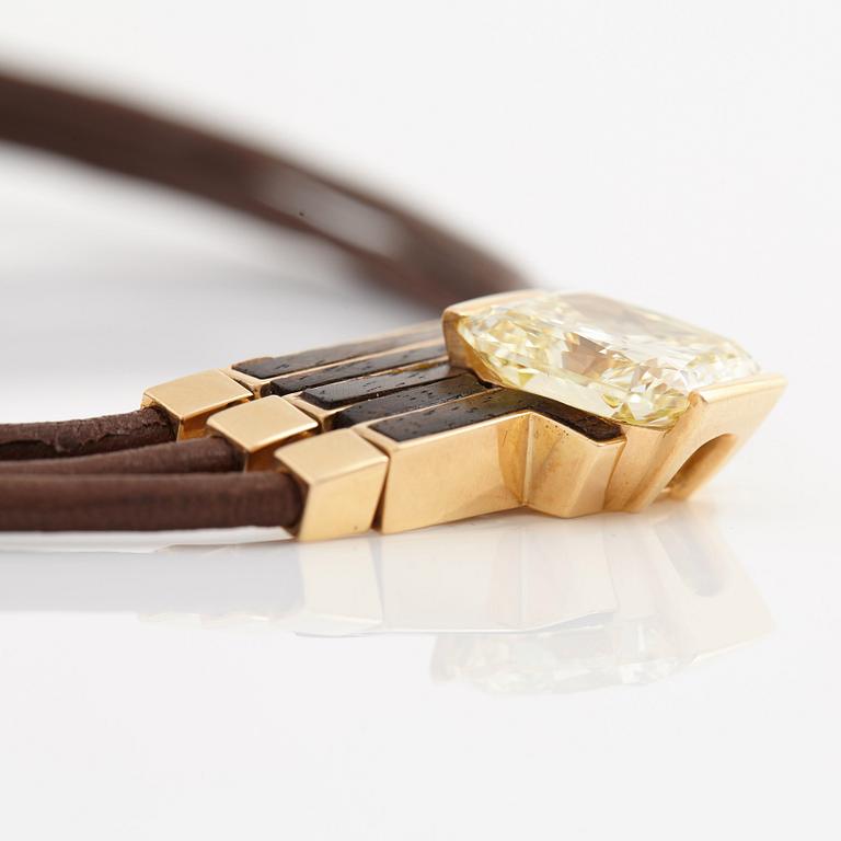 A Paul Binder necklace with a modified radiant-cut diamond ca 16 cts quality ca Fancy Light Yellow vs/si.