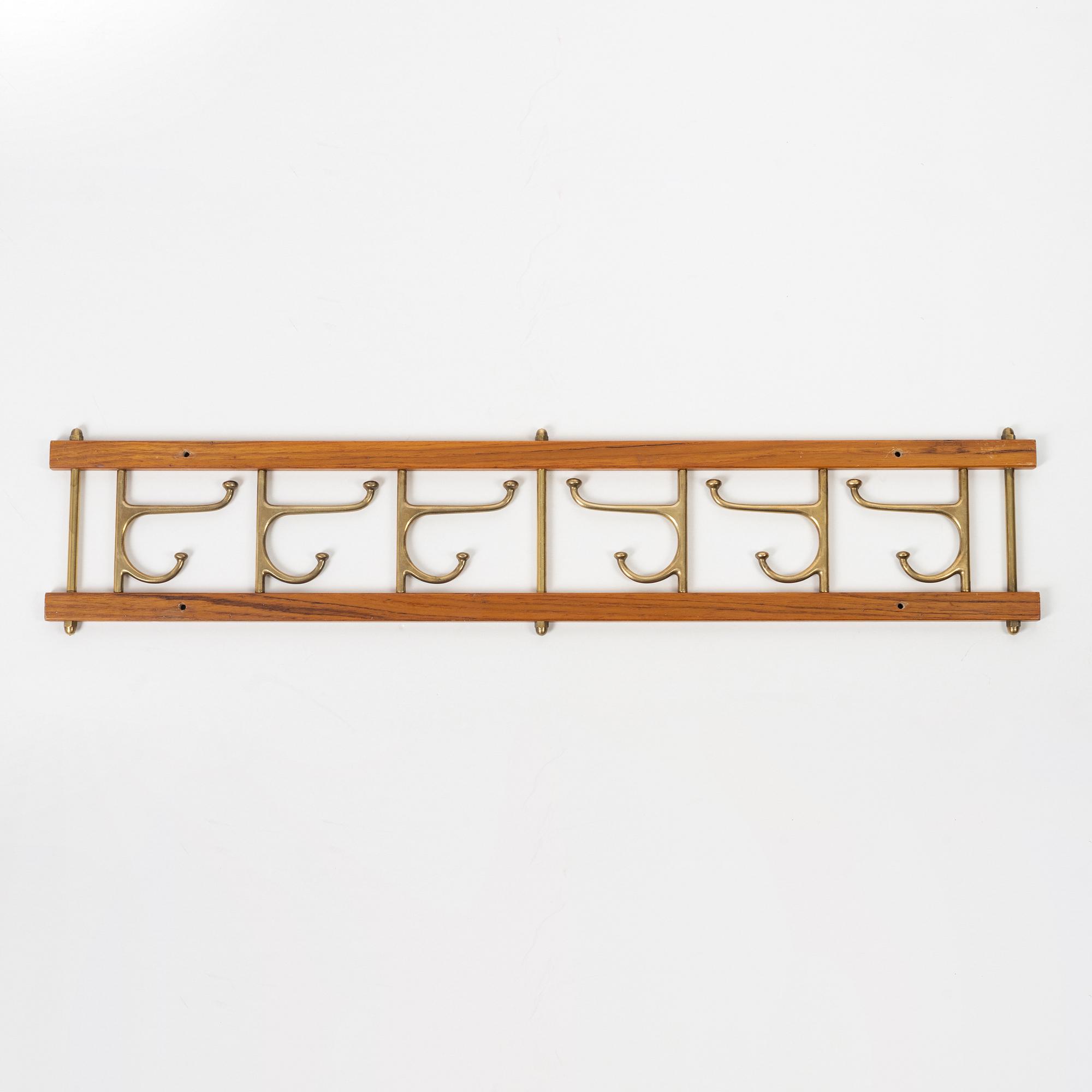 Klädhängare, "Dekorativ", Skoglunds metallgjuteri, Anderstorp, 1950/60-tal.