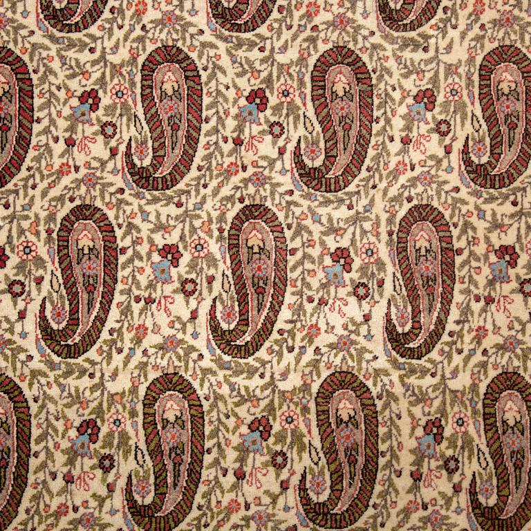 A CARPET, semi-antique Qum, ca 341 x 238 cm.