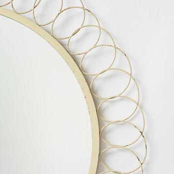 A painted metal mirror, first half of the 20th century.