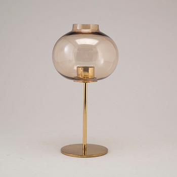 A brass and glass Hans-Agne Jakobsson  candlestick, 1960s / 70s.