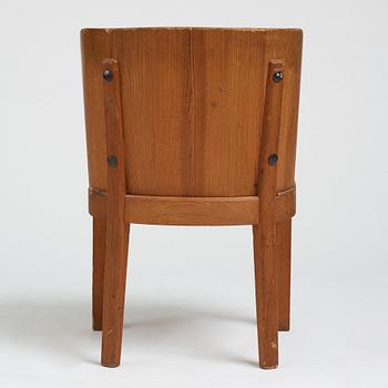 Axel Einar Hjorth, a stained pine low back "Lovö" chair, Nordiska Kompaniet, Sweden 1930's.