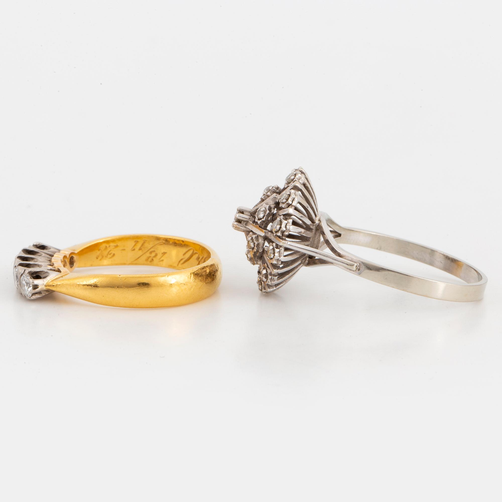 Two rings 23K gold and 18K vitguld.