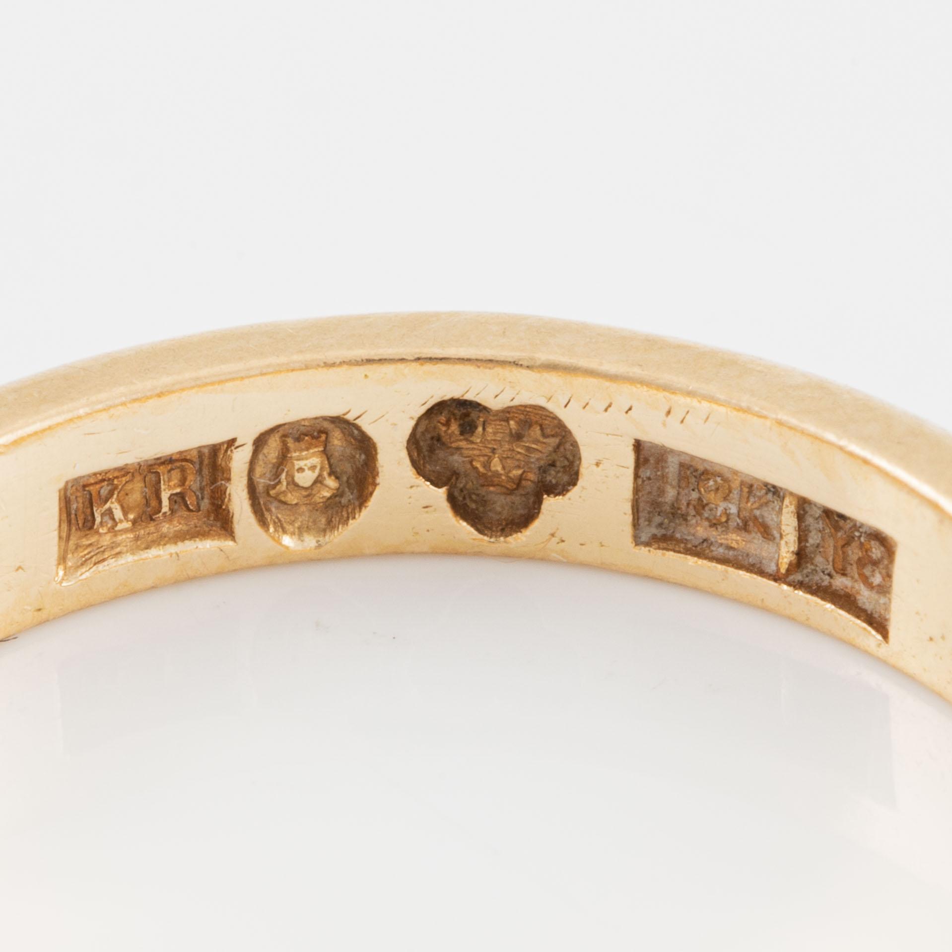 Ring 18K gold.
