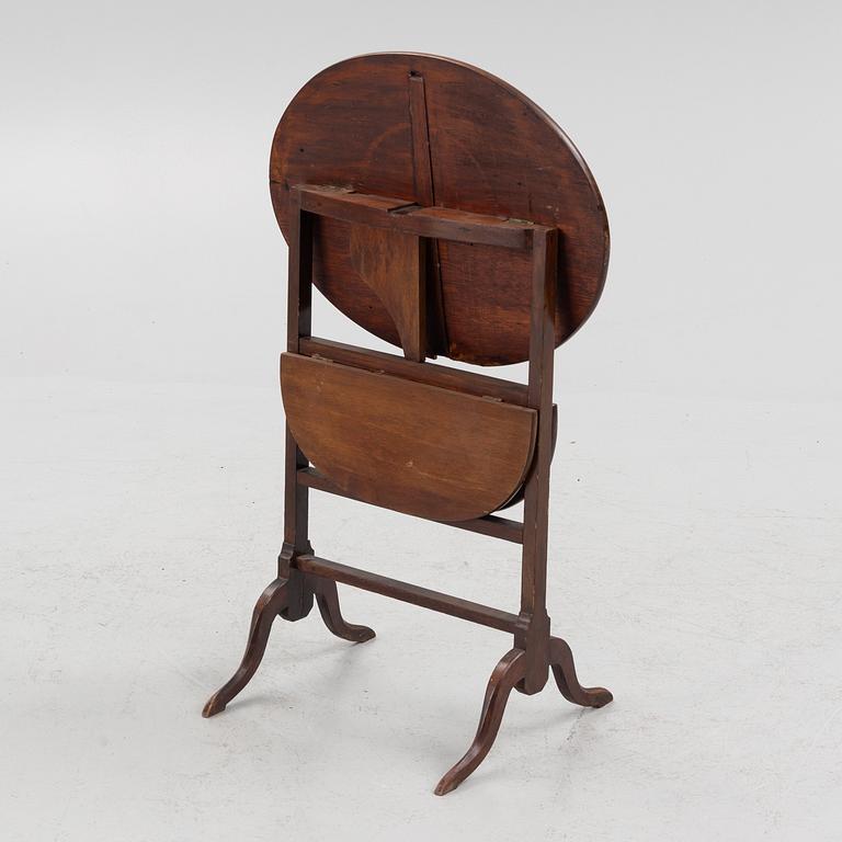 A folding table, England, late 19th Century.