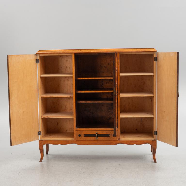 A birch wood veneered cabinet, 1920s.