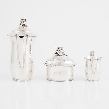 A Swedish Silver Coffee Pot, Creamer and Sugar Bowl, mark of Carl Fredrik Carlman, Stockholm 1951-54.